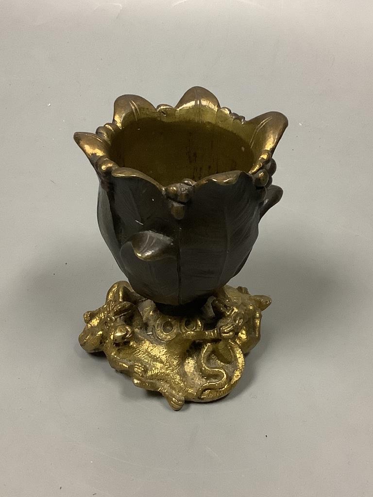 A small bronze 'tulip head' vase with gilt 'dragon' base, height 9cm